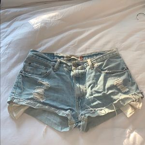 Levi distressed/destroyed light wash denim shorts